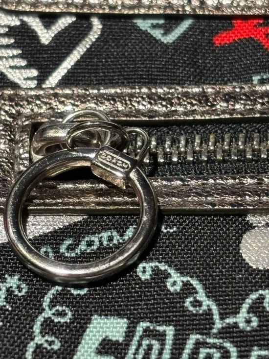 Coach Black Poppy Print Shoulder Bag or Wristlet with Metallic Trim - Picture 2 of 16